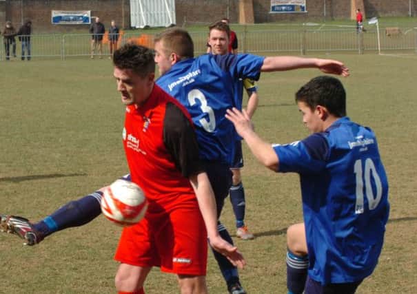 Action from Sidley United's game against Rye United last Easter. Picture by Simon Newstead