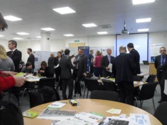 Guests gather at the annual general meeting of Lancing Business Parks Business Improvement District SUS-140227-152921001
