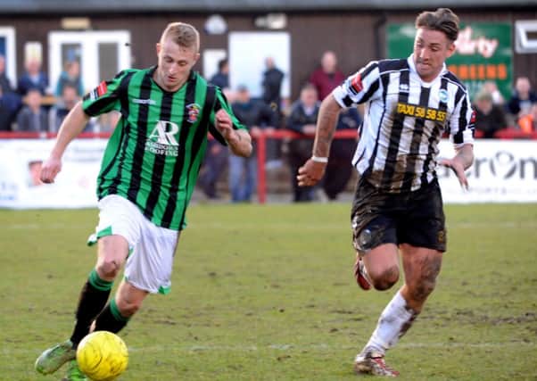 Burgess Hill (green shirt) v Peacehaven and Telscombe. Pic Steve Robards SUS-140303-104225001