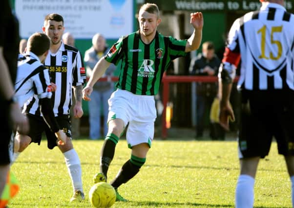 Burgess Hill (green shirt) v Peacehaven and Telscombe. Pic Steve Robards SUS-140303-103808001