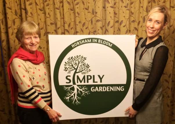 In Bloom Chairman Sue Brundish and designer Ceri Fitzgerald with the Simply Gardening logo SUS-140303-105646001