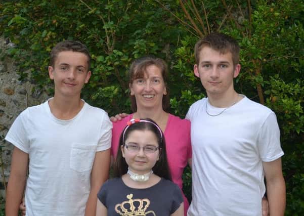 Twelve-year-old Jennifer Lynch (middle) has received lots of support from her family