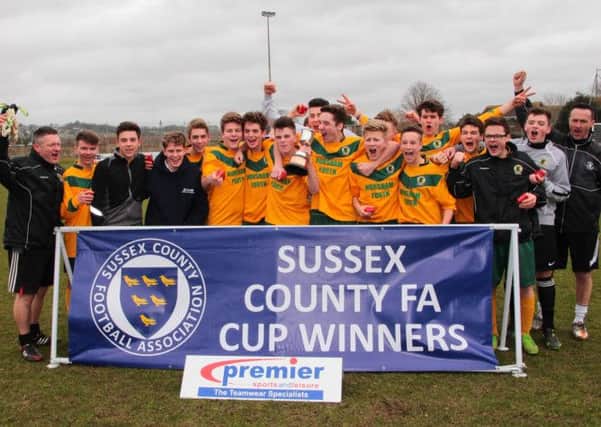 Champions! The Horsham U16s celebrating their County Cup success, and below, captain Lewis Reeves with the trophy. Pictures by Terry Buckman