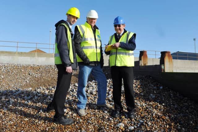 From left, Adur Council assistant engineer Glenn Longley, Shoreham Port director of engineeering Tony Parker and  Cllr David Simmons S09308H14