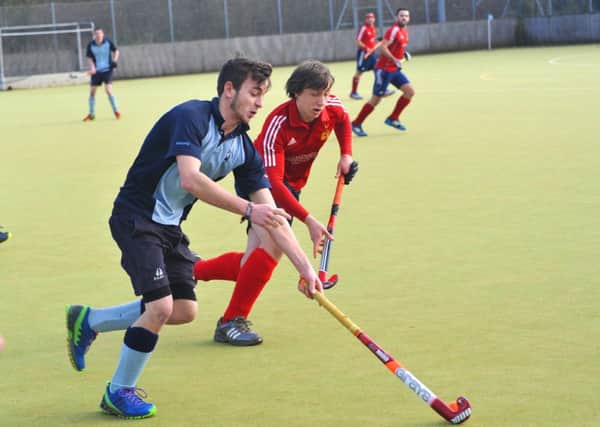 Alex Coombs on the ball for South Saxons in the defeat to Mid-Sussex. Picture by Steve Hunnisett (fh09012e)