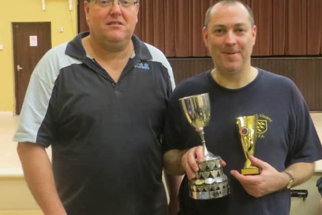 Men's singles winner Paul Barry (right) with Hastings & District Table Tennis Association president Andy Furnival. Picture courtesy Mick Lane