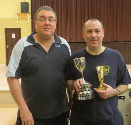 Men's singles winner Paul Barry (right) with Hastings & District Table Tennis Association president Andy Furnival. Picture courtesy Mick Lane