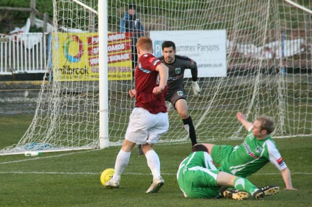 Trevor McCreadie goes for goal during Hastings United's last home game against Guernsey. Picture by Terry S. Blackman