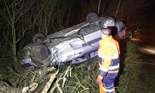 A car was found in a ditch near Patching. Photo by Eddie Mitchell