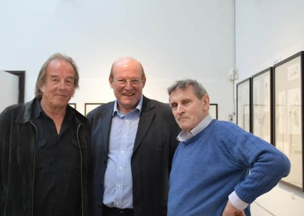 Malcolm Love (left) with two attendees at the Life Lines art exhibtion