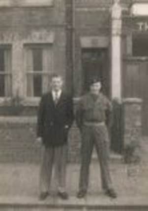 Roy Kelly, right, and his cousin, outside his house in Southfield Road