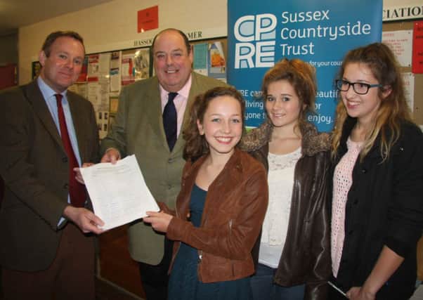 Nick Herbert MP and Nicholas Soames MP with 15 year olds Imogen Watson from Twineham, Holly Richardson from Burgess Hill and Annabel Locke from Henfield. ENGSUS00120131031091733