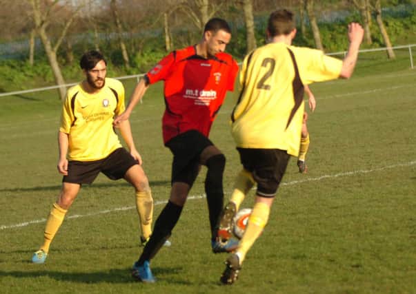 Gregg Berry on the ball for Rye United during their 4-1 defeat at home to Hassocks on Saturday. Picture by Simon Newstead