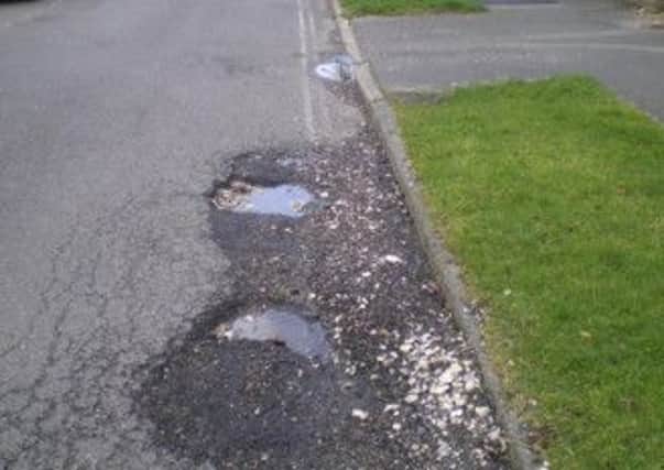 Potholes have been targeted by the county council.