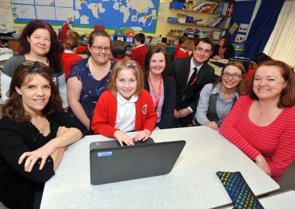 12/3/14- Pupils with new laptop computers at Battle and Langton School.  Head Simon Hughes with pupils and members of the Parent Teacher's Association. SUS-141203-125115001