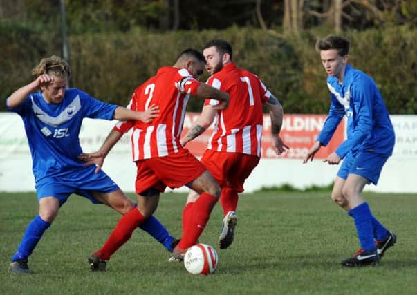 Action from the two sides last encounter in March, which Steyning won 1-0