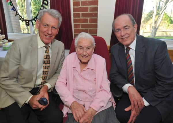 15/3/14- 100th birthday celebrations for Sybil Pryce, pictured here with sons Tony and John Stevenson SUS-140315-165230001