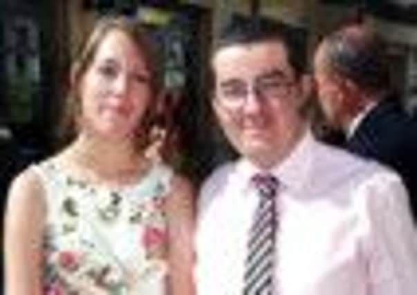 Police have launched a murder investigation following the death of Terry Davies, right, who was killed when his flat burnt down. Mr Davies is pictured with his girlfriend Kerry Stark, 19