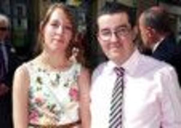Police have launched a murder investigation following the death of Terry Davies, right, who was killed when his flat burnt down. Mr Davies is pictured with his girlfriend Kerry Stark, 19. ENGSUS00120131218092115