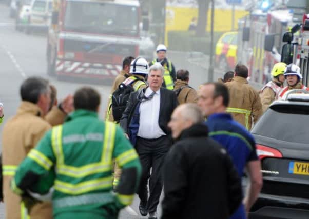 JPCT 200314 Fire at Millais School, Horsham. Headteacher Leon Netley arrives at the scene. Photo by Derek Martin SUS-140320-181453001