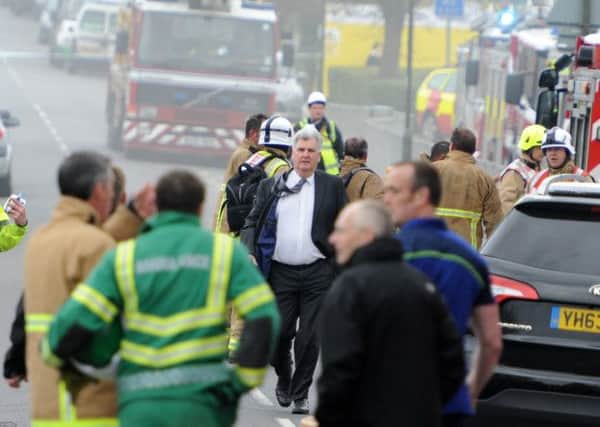 JPCT 200314 Fire at Millais School, Horsham. Headteacher Leon Nettley arrives at the scene. Photo by Derek Martin SUS-140320-181453001