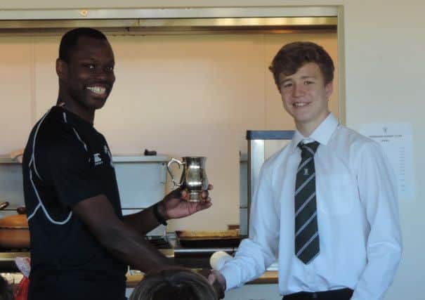Max Wright getting his man of the match award fron Head Coach Dayle Kirby