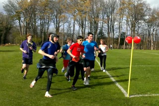 Students and staff run, walk and somersault the Sports Relief Mile at Steyning Grammar School