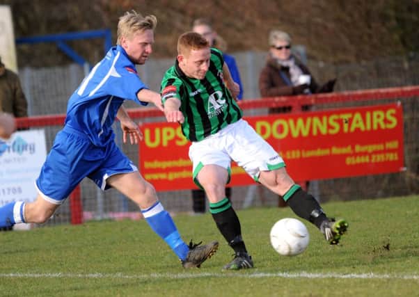 Burgess Hill FC (black and green) v Hythe (blue). Pic Steve Robards SUS-140323-155148001