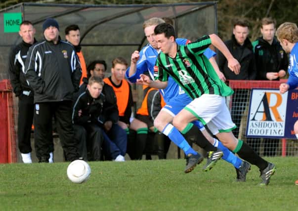 Burgess Hill FC (black and green) v Hythe (blue). Pic Steve Robards SUS-140323-155319001