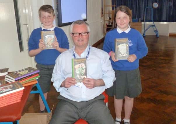 Children's author Jack Trelawny visits to Castlewood School SUS-140324-125055001