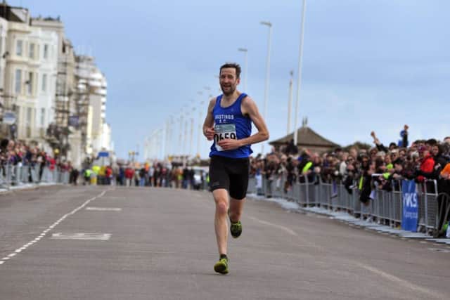 Jeff Pyrah comes home to finish fourth in the Hastings Half Marathon. Picture by Steve Hunnisett