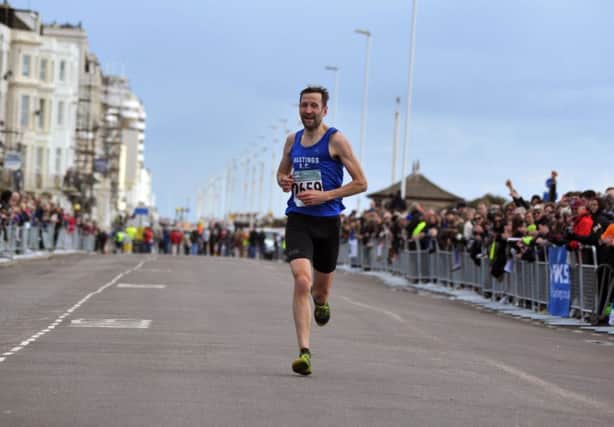 Jeff Pyrah comes home to finish fourth in the Hastings Half Marathon. Picture by Steve Hunnisett