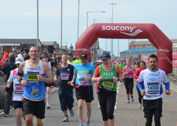 Runners fill up Basin Road South next to Carats Cafe in Southwick during last year's Brighton Marathon