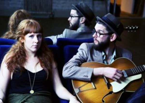 Folk duo called Hickory Signals, Laura Ward and Adam Ronchetti