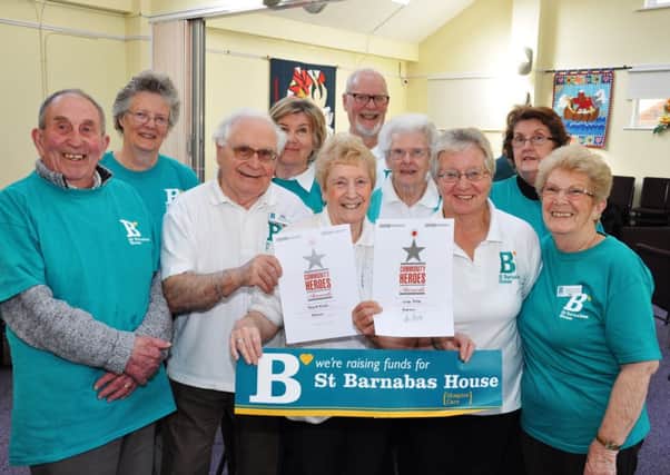 Friends of St. Barnabas members with their BBC Community Heroes nomination certificates. Pic by Mike Beardall, Oakfield Media www.mikebeardall.com SUS-140326-105226001