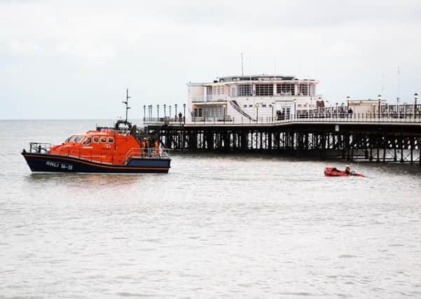 A woman was recovered from the water near Worthing Pier yesterday evening         Photo by Eddie Mitchell