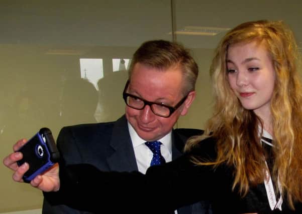 Laura Fuller, 15, snaps a selfie with Michael Gove