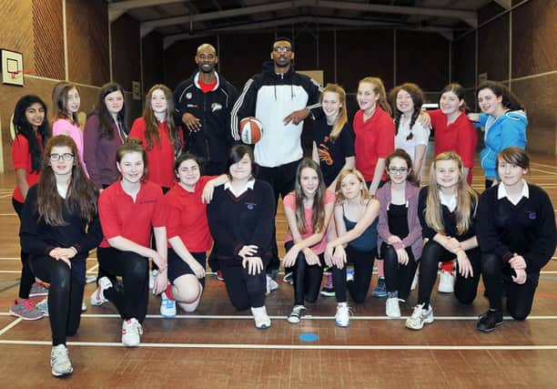 W13024H14-WorthingThunders

Davison High School pupils training with the Worthing Thunders. Cast of High School musical train with baseball, Worthing Thunder players, L-R   Terrell Bell and  Rory Spencer. Worthing. SUS-140326-083425001