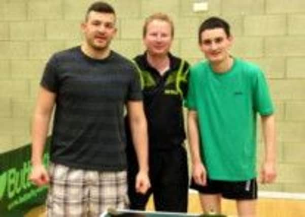 Crawley and Horsham Table Tennis League champions Foresters A. 
From left - Adam Todd, Wes Bush-Harris and Mark Collins SUS-140331-195450002