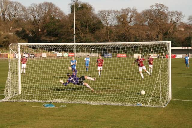 Sam Adams puts Hastings United ahead from the penalty spot during last weekend's 4-0 win at home to Worthing. Picture by Terry S. Blackman