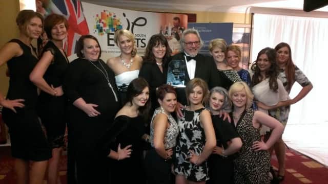 Q Hair and Beauty won Employer of the Year at The Observer and Gazette Business Awards 2014 SUS-140404-231328001