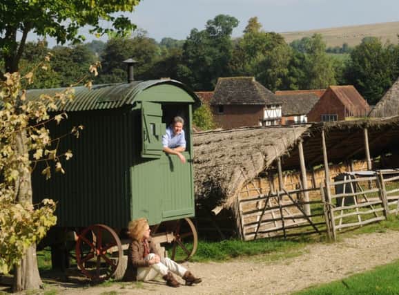 Dave and Julie Morris who have spent 10 years photographing shepherd huts, here pictured at the Weald and Downland Museum

Picture by Louise Adams C131501-1 Chi Shepherd Huts SUS-140704-072721003