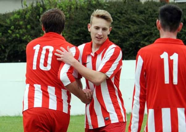 Rob Clark celebrates his fine opening goal for Steyning on Saturday (S14567H14)