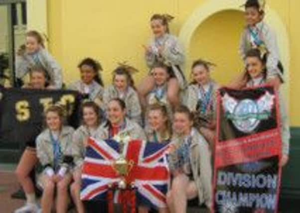 Young cheerleaders from the Sussex Tornados became international champions during a cheerleading competition in Florida