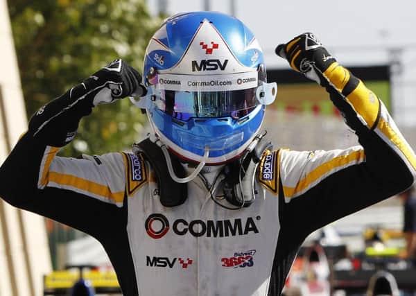 Jolyon Palmer from Southwater celebrates his Sprint Race win in Bahrain. Pictures by Sam Bloxham