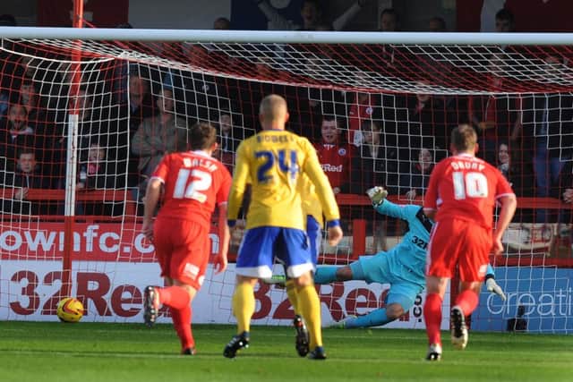 Paul Jones is beaten from the spot in the reverse fixture at the Broadfield which Brentford also won 1-0. Pic Jon Rigby
