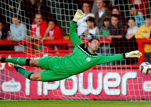 Crawley Town goalkeeper Paul Jones - pictured last season - has made two costly errors in the last three matches