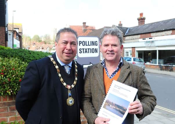 The mayor of Arundel, Michael Tu, and James Stewart with the referendum as the polling takes place in the town