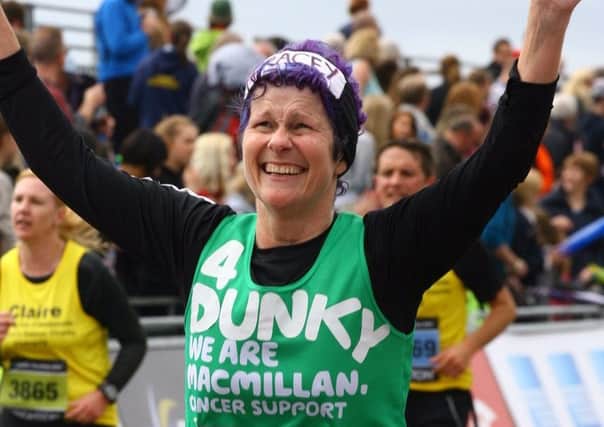 Tracey Prescott from Henfield finishes the Brighton Marathon in 2014. Photo by Marathon Photos.com
