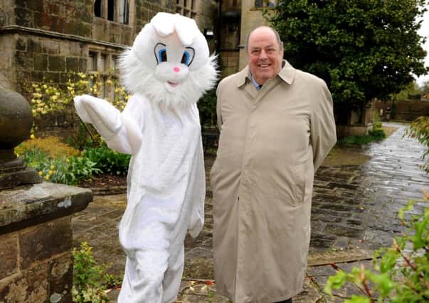The Easter Bunny (left) welcomes Nicholas Soames MP to Borde Hill Garden as part of the Visit Englands English Tourism Week on Monday 7th April. Pic Steve Robards SUS-140804-110342001
